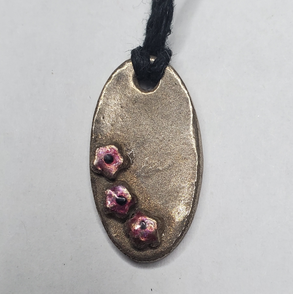 Handmade necklace with pink flowers
